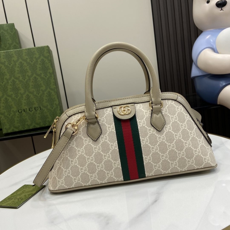 G*u*i top handle bags